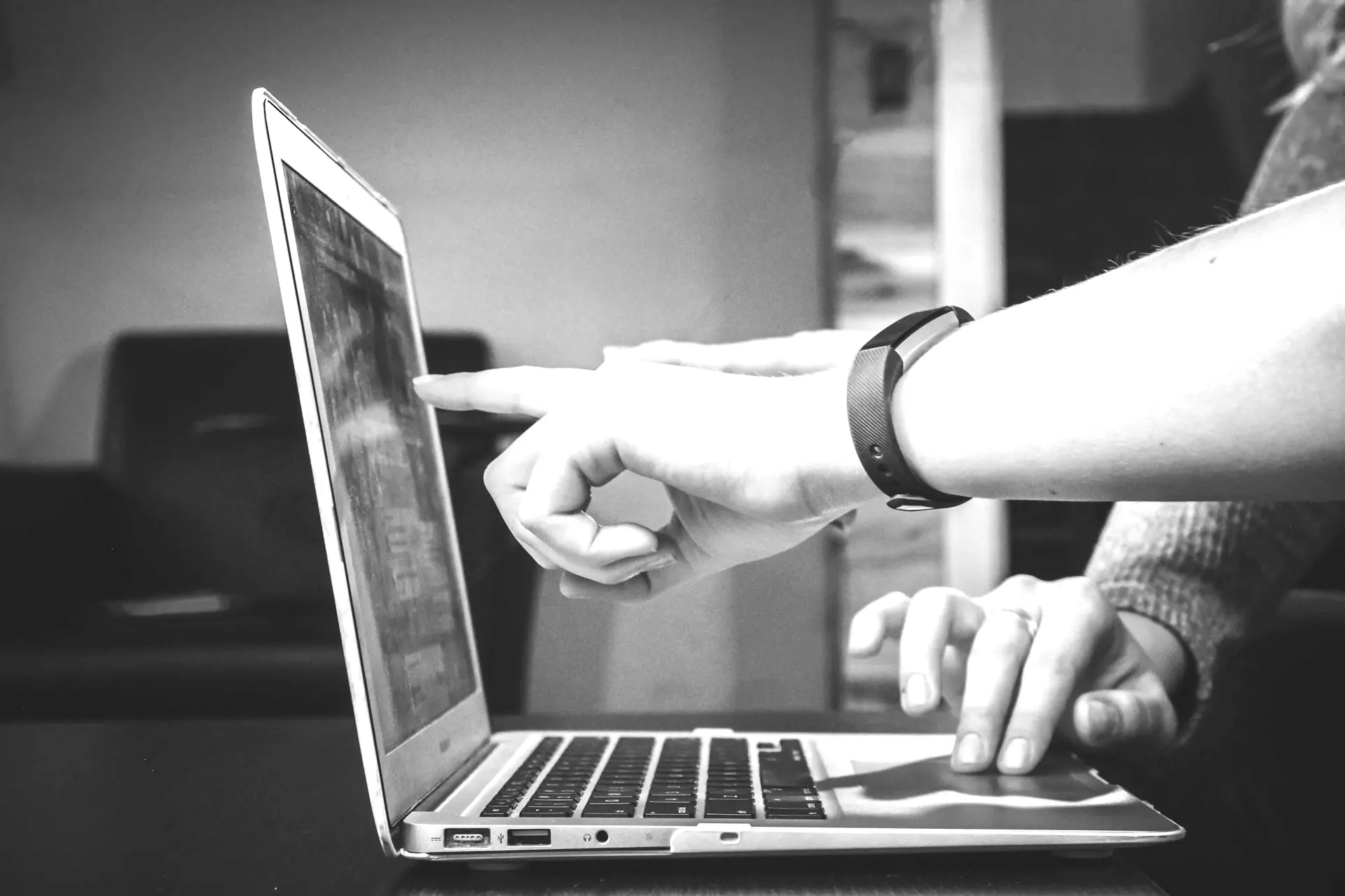 person using laptop